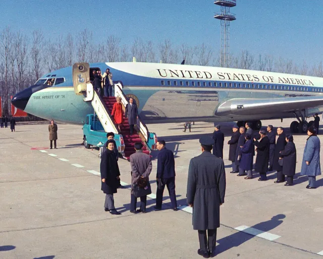 The Nixons leave Air Force One in Beijing, photograph