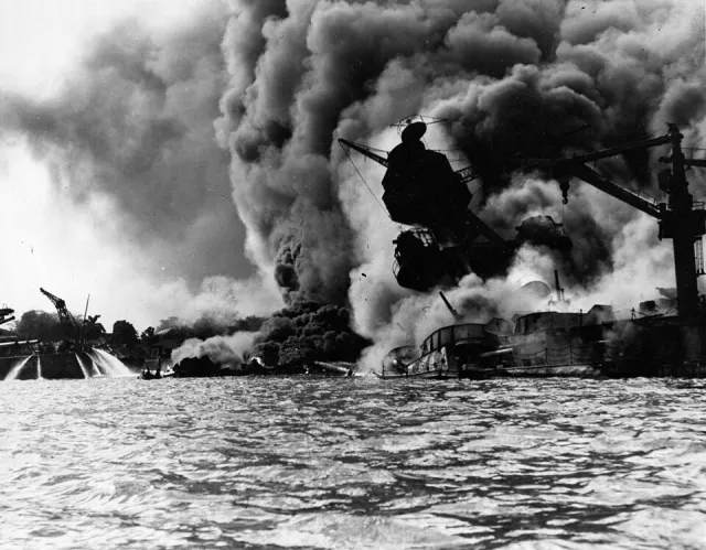 USS Arizona burning at Pearl Harbor, photograph